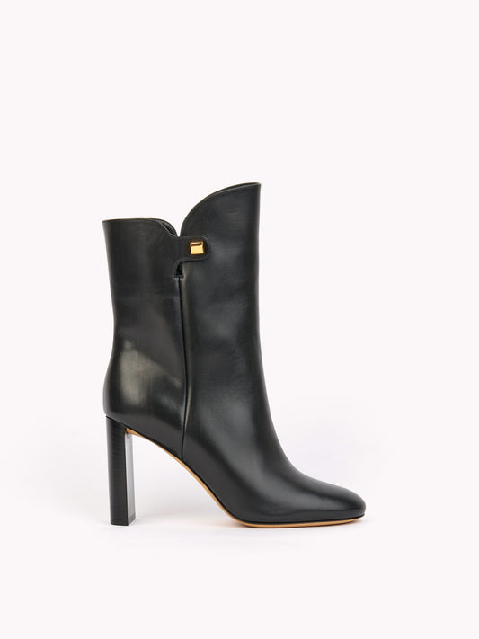 elegant black leather high-heel ankle boots maison skorpios by adriana abascal emanuele filiberto