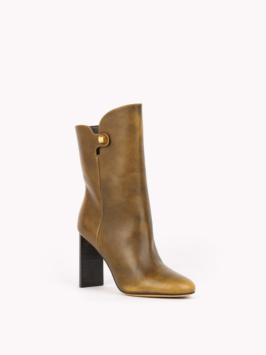 elegant brown leather ankle boots maison skorpios by adriana abascal emanuele filiberto