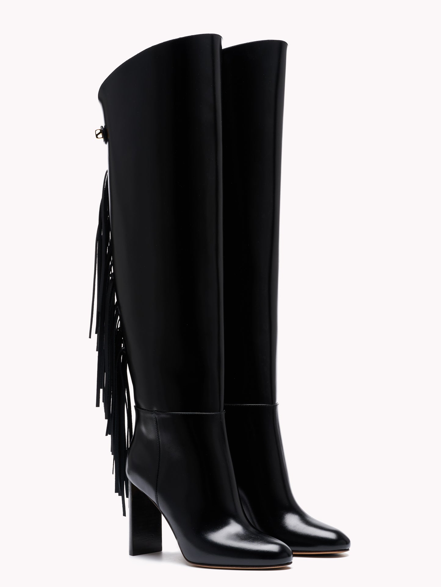 Adriana Calypso High-Heel black leather boots with fringes