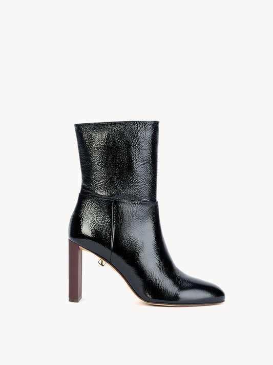 Ankle boots in black grained patent leather. High-heel, Luxurious shoes by Adriana Abascal. Emmanuel of savoy