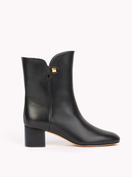 Bottines de luxe en cuir noir et talon bloc maison skorpios par adriana abascal